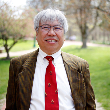 Joel Ybe smiles in his headshot.