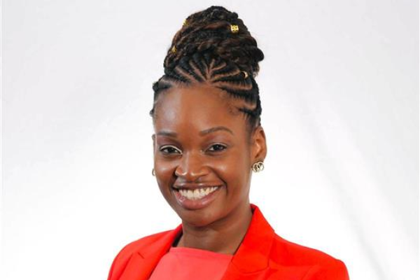 Omolola (Lola) Adeoye-Olatunde smiles in her headshot.