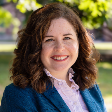 Leigha MacNeill smiles in her headshot.