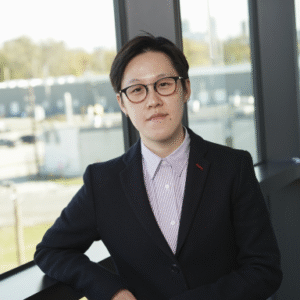 Erica Cai smiles in her headshot.
