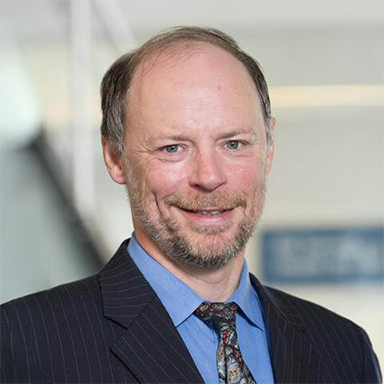 Headshot of Titus Schleyer, DMD, PhD