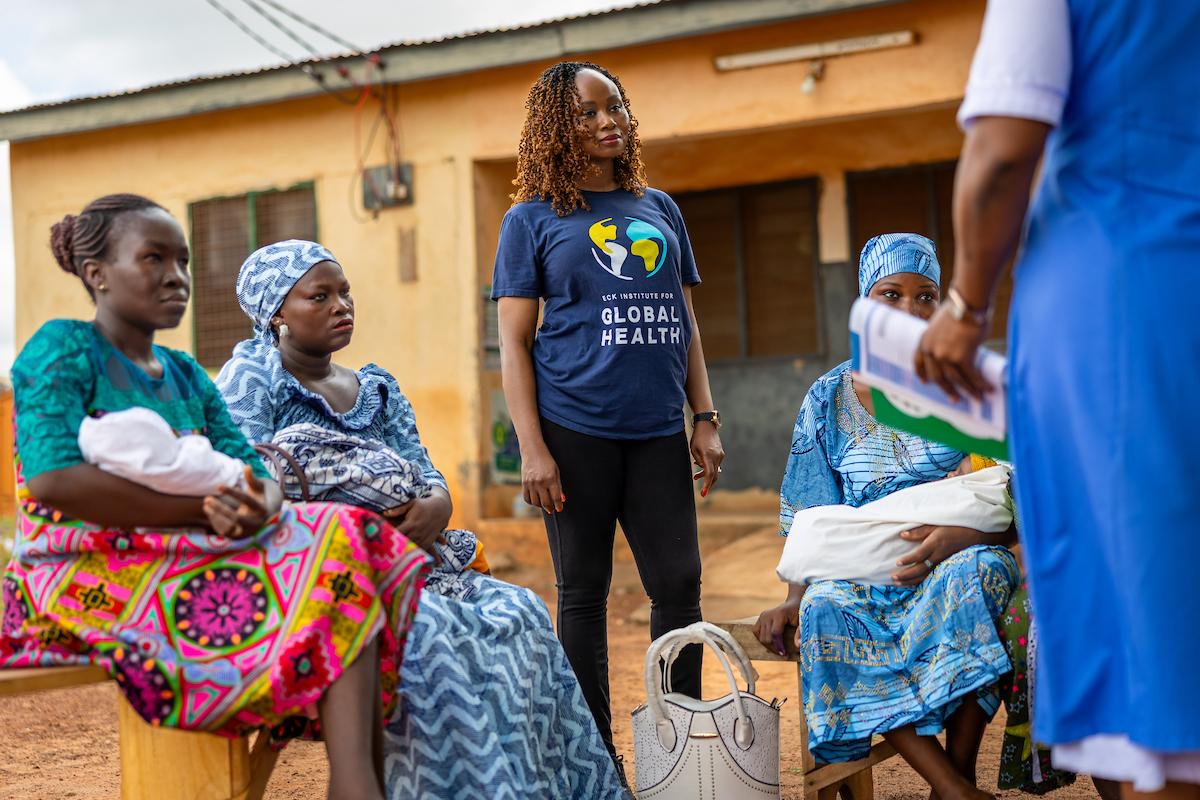 Joyce Adams working with mothers in Ghana.