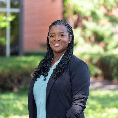 Crystal Givens smiles in her headshot.