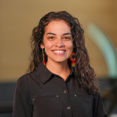 Natalie Guerrero smiles in her headshot.