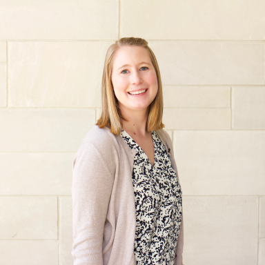 Lauren O'Reilly smiles in her headshot.