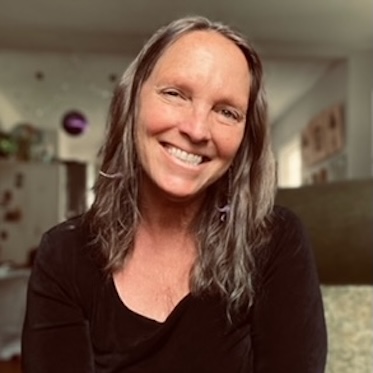Janet Panoch, PhD, smiles in a headshot.