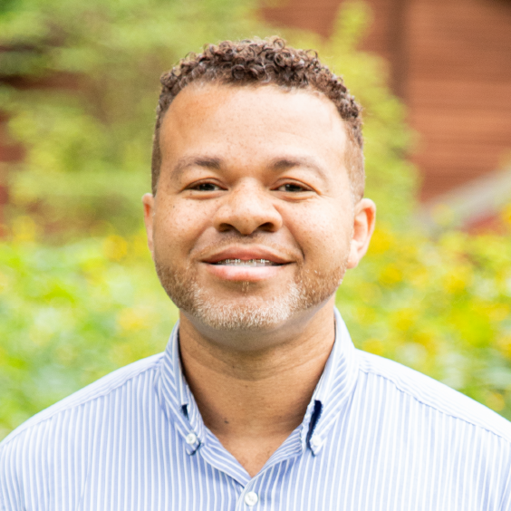 Virgil Gregory, PhD, MSCR, MSW, LCSW, LCAC smiles in his headshot.