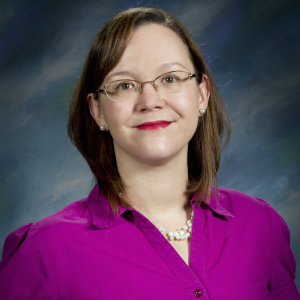 Marxa Figuerdo smiles in her headshot.