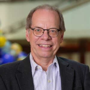 Todd Skaar smiles in his headshot.