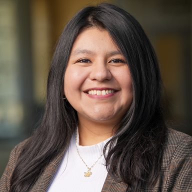 Lily Hernandez smiles in her headshot.