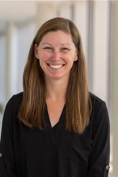 Lauren Magee smiles in her headshot.