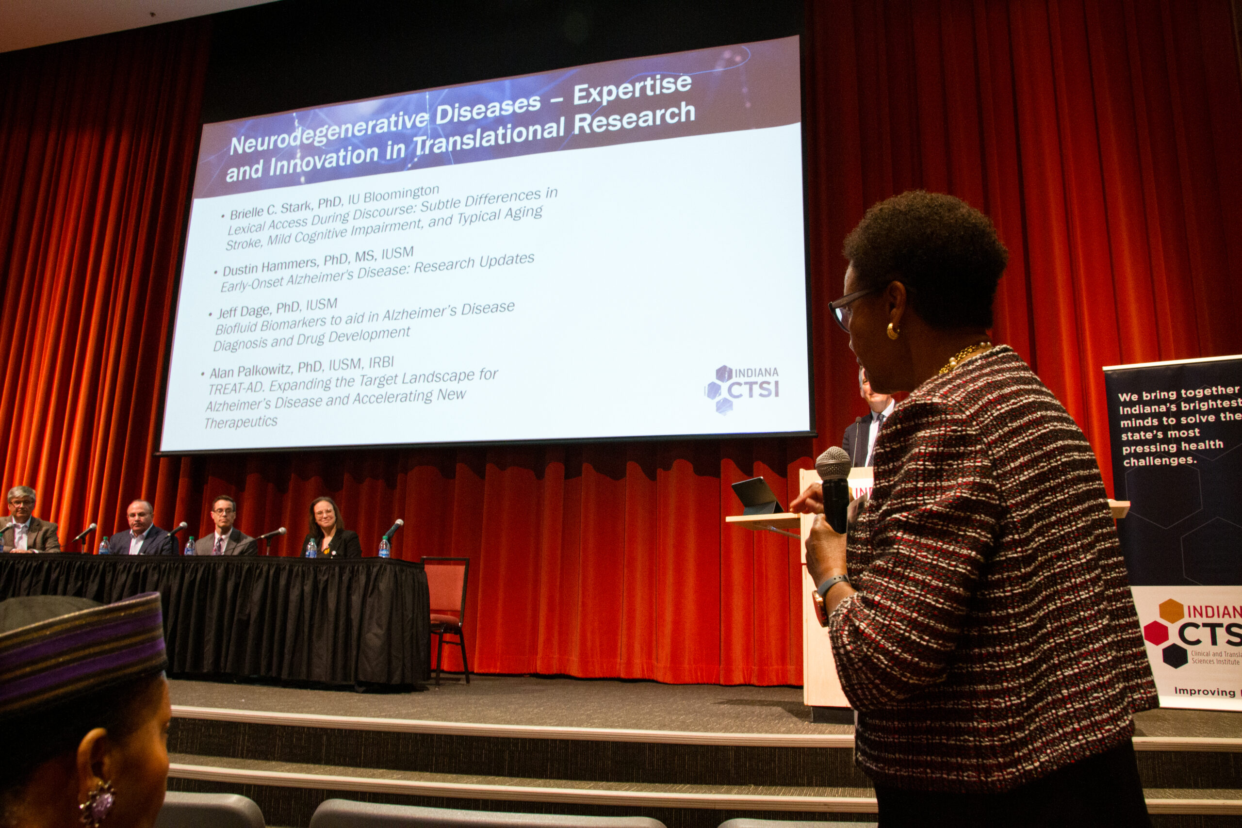Peggye Dilworth-Anderson asks the panel a question during the Q and A portion of the presentation