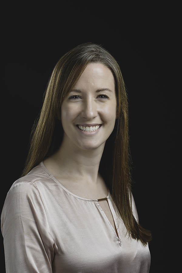 Julia van Kessel smiles in her headshot