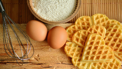 photo of eggs, waffles and bowl of flour